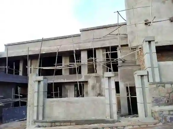 Waiting for the bus in the desert